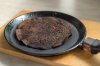 spoiled-burned-pancake-frying-pan-scorched-pancake-frying-pan-wooden-stand-117342992.jpg